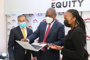 Equity Group Managing Director and CEO, Dr. James Mwangi (centre), Group Director Strategy, Strategic Partnerships and Investor Relations, Brent Malahay (left) and Group Head of Financial and Regulatory Reporting, Mary Nteere (right) discuss the Group's 2021 Half Year performance during the Group Investor Briefing. Equity Group announced a 98% growth in half year profit to Ksh 17.9B up from Ksh 9.1B the previous year. Total Assets grew by 50% to Ksh 1.12 trillion, deposits by 51% to Ksh 820.3B & net loans by 29% to Ksh 504.8B.