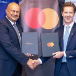 Bhartesh Shah, CEO of SBM Bank Kenya (L) and Mark Elliott, Division President, Africa at Mastercard (R) during a recent meeting in Nairobi. Mastercard and SBM Bank Kenya have entered into a 10-year strategic agreement that will advance innovation in financial technology in Kenya.