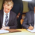 Right: TMA Board Chair and former Prime Minister of Ethiopia, H.E. Hailemariam Desalegn Boshe, and the Danish Ambassador to Kenya, H.E. Stephan Schønemann, sign the agreement.