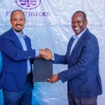 Absa Bank Kenya CEO Abdi Mohamed (Right) and Transafrica Motors Managing Director Ali Zubedi sign a memorandum of understanding for a strategic partnership with Transafrica Motors to support businesses in scaling their transport, logistics, and mobility operations.