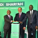 Safaricom CEO,Dr.Peter Ndegwa, GulfCap-Chairman Suleiman Shahbal,and Justus Ogoti of CMA